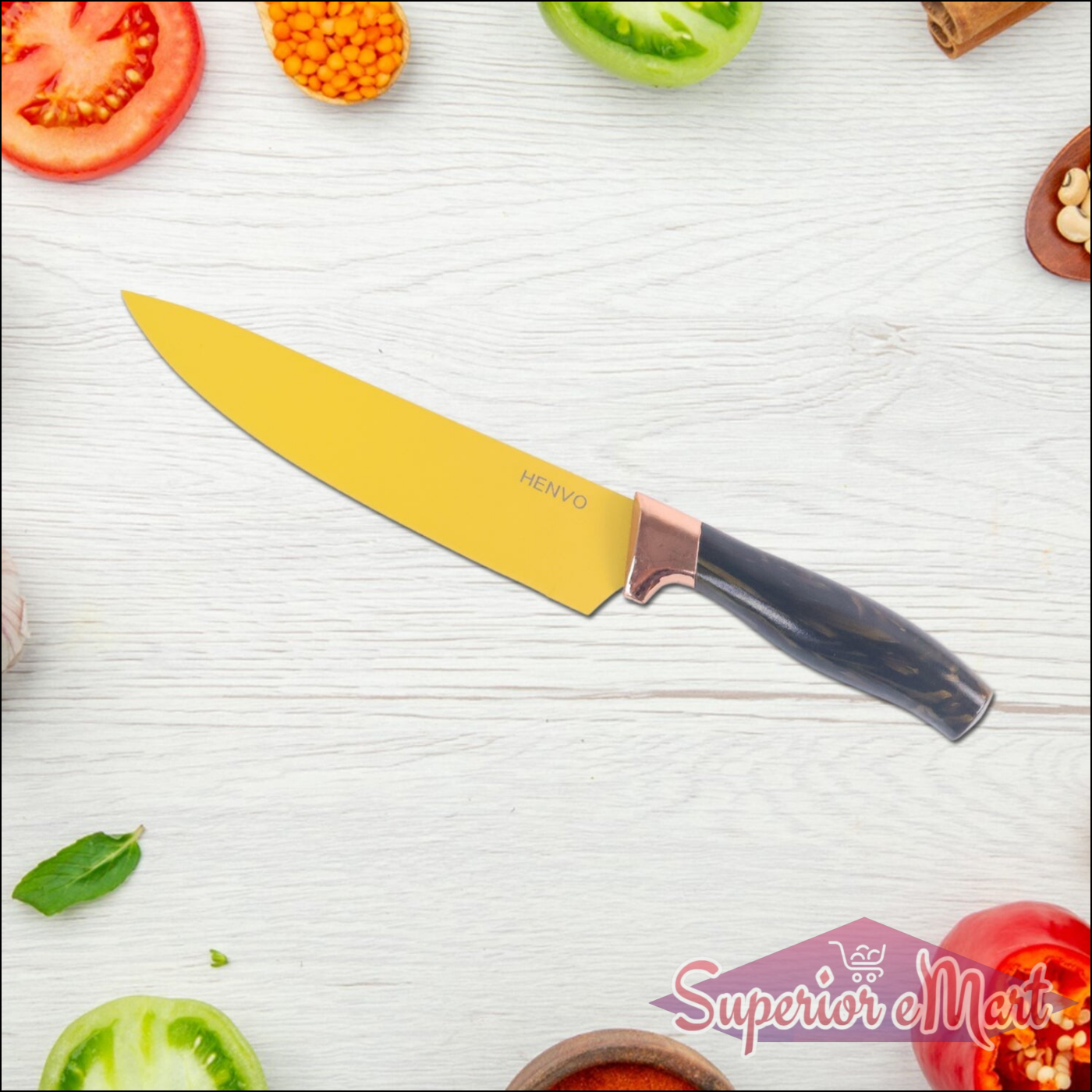 Professional kitchen knife set displayed with fresh vegetables and herbs on a wooden countertop