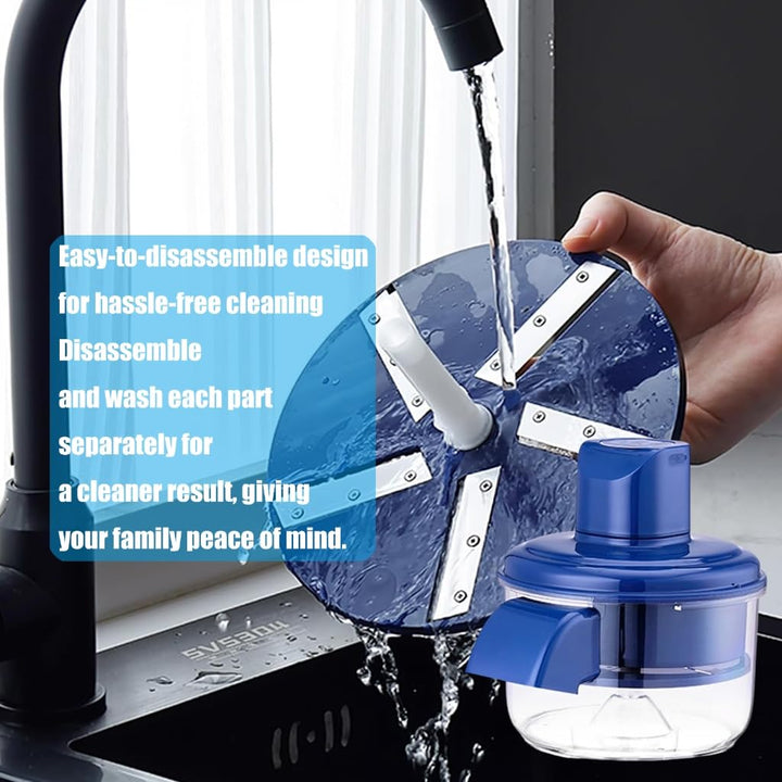Blue food chopper being rinsed under a faucet. Features easy-to-disassemble metal blades and clear plastic bowl.