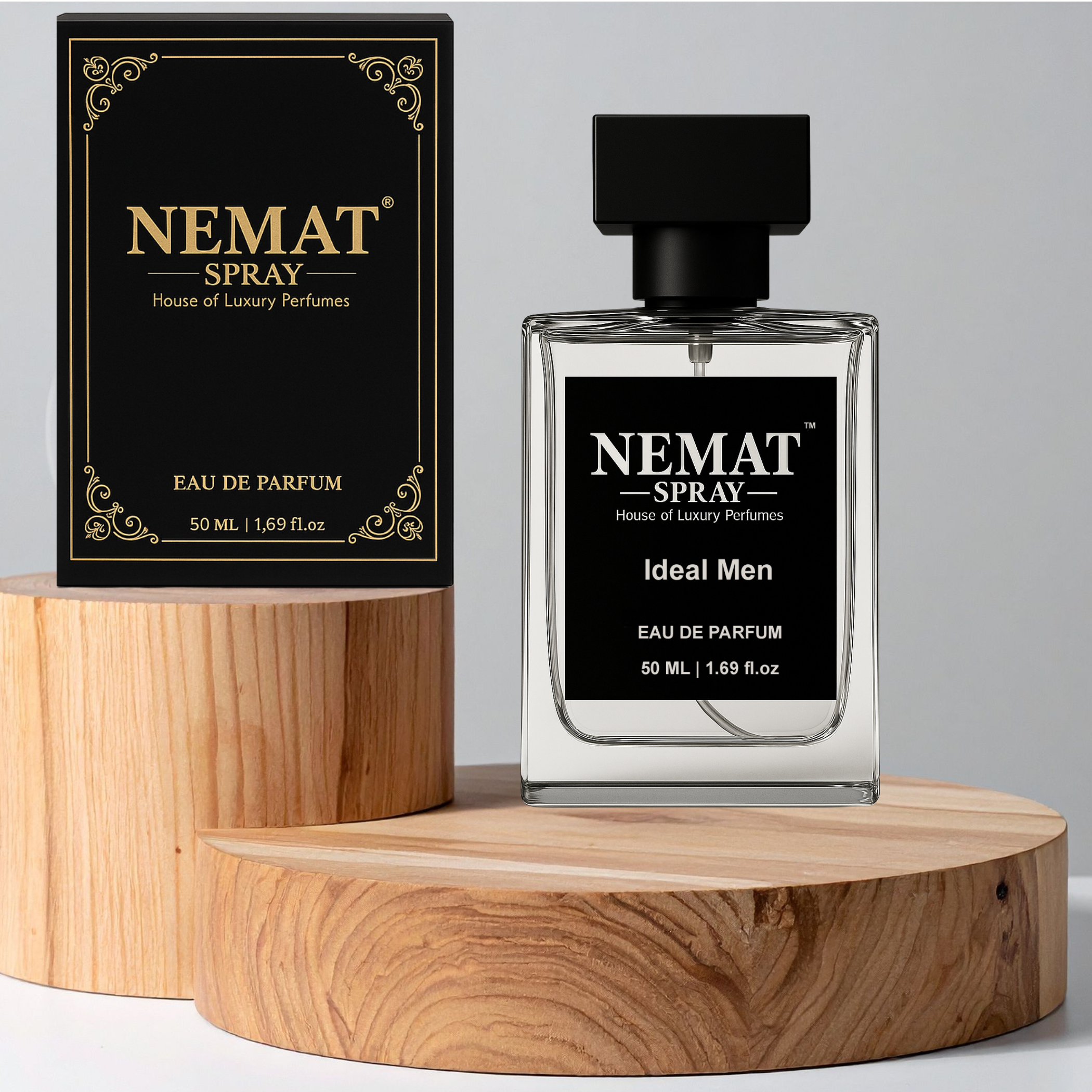 Nemat Ideal Men 50ml Eau de Parfum spray bottle and black/gold box on wooden pedestals.