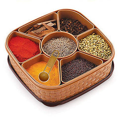 Masala rangoli box for storing spices, featuring multiple compartments.