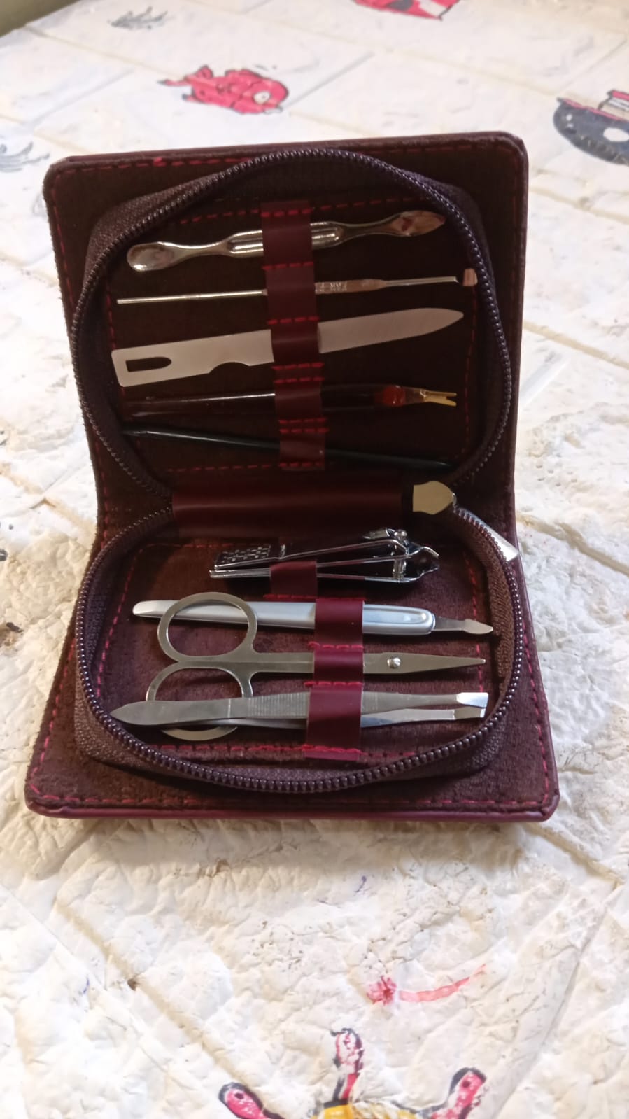 Nail grooming kit with leather travel case