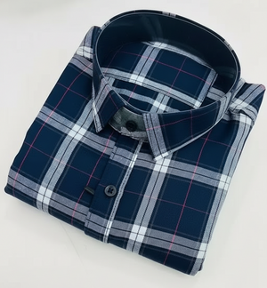 Folded plaid shirt on a white background