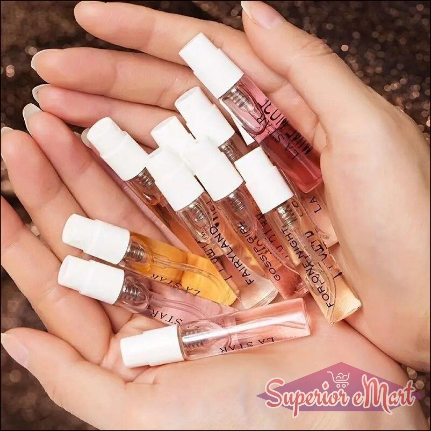 Variety of mini fragrances in a hand, featuring 8 Perfumes Gift Box for scent lovers
