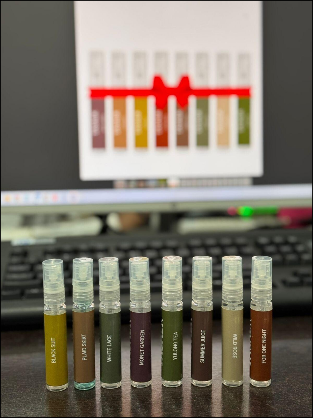 8 Perfumes Gift Box featuring assorted fragrance samples in travel-friendly spray bottles