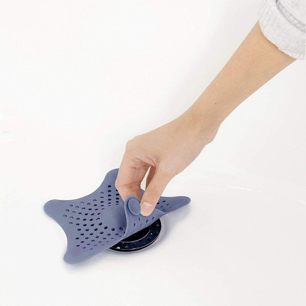 Bathroom sink drain strainer with star shape for hair collection