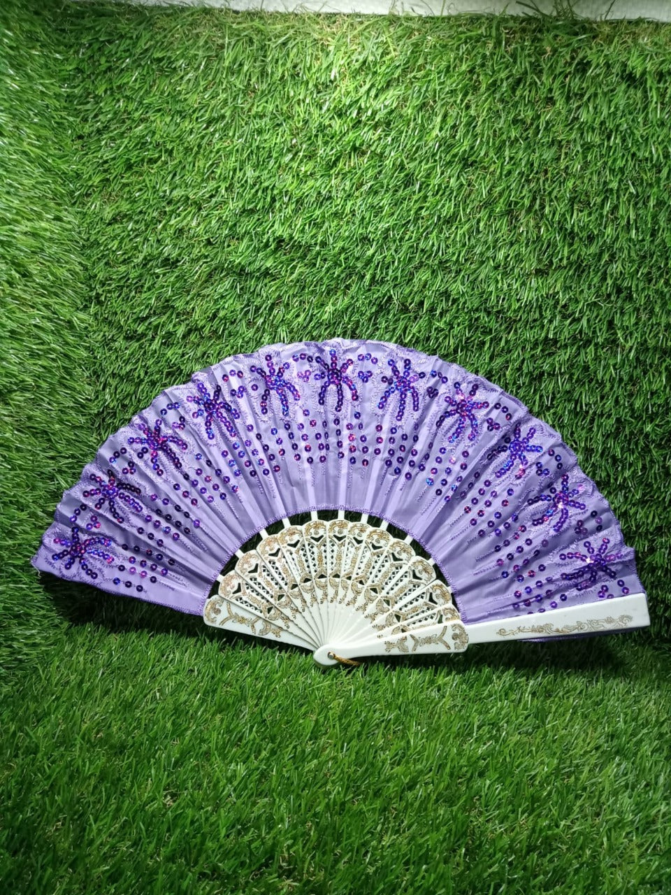 Chinese vintage folding fan with a fabric sleeve