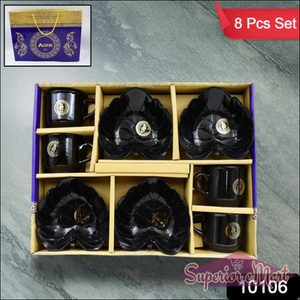 Elegant black ceramic tea cup and bowl set, includes four cups and four bowls in a stylish box