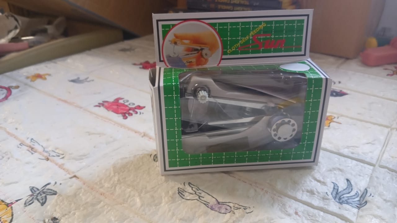 Portable hand sewing stapler for garments