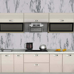 Modern kitchen with white cabinets and black appliances featuring adhesive kitchen wallpaper with gray marble design