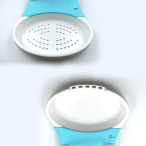 Adjustable cut and wash kitchen tool in blue and white, designed for rinsing and draining food easily