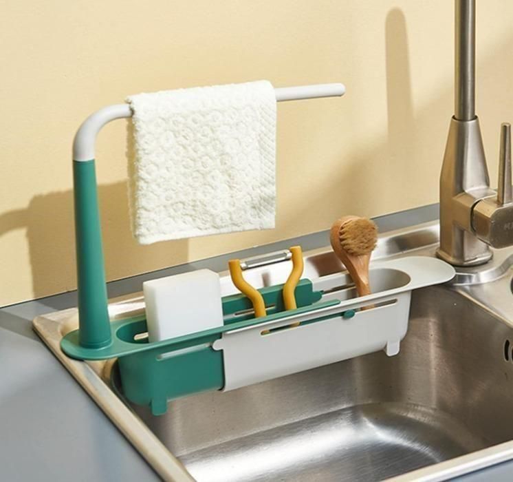 Superior eMart adjustable sink organizer in green and white with towel holder and compartments for soap and cleaning tools