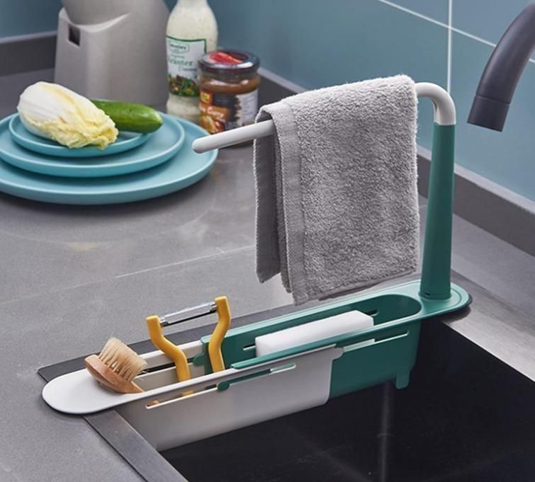 Adjustable sink organizer by Superior eMart with towel rack and compartments for kitchen tools and sponges