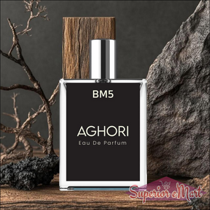 AGHORI The Mystical Perfume in a glass bottle with a wooden cap against a rocky background