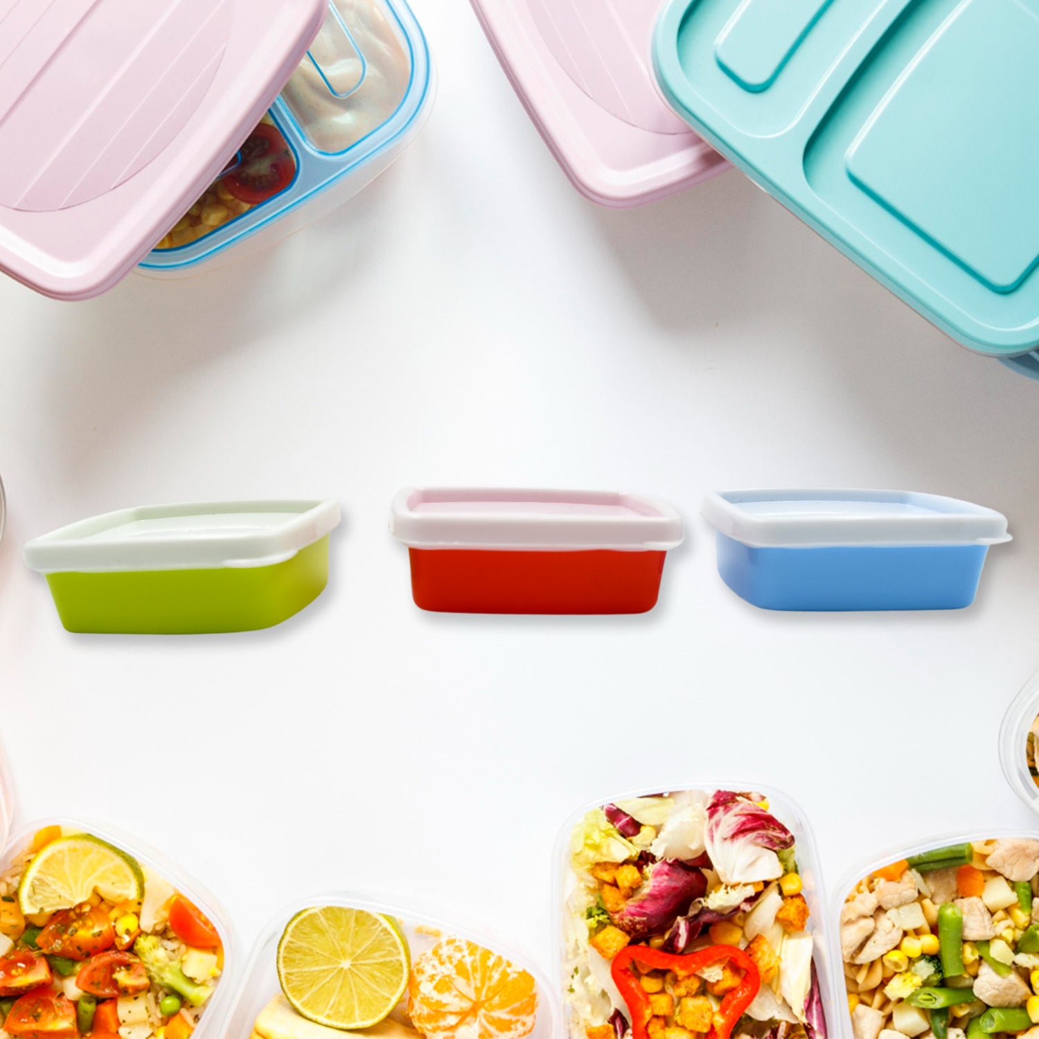 Airtight food storage containers set in various sizes with colorful lids and fresh ingredients