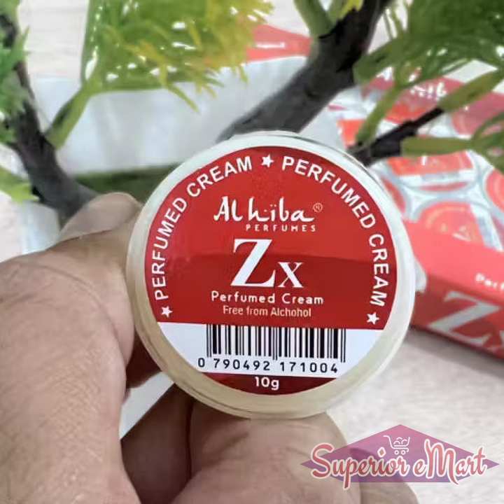 Alhiba Perfumes Zx Perfumed Cream container held by a hand with a blurred background