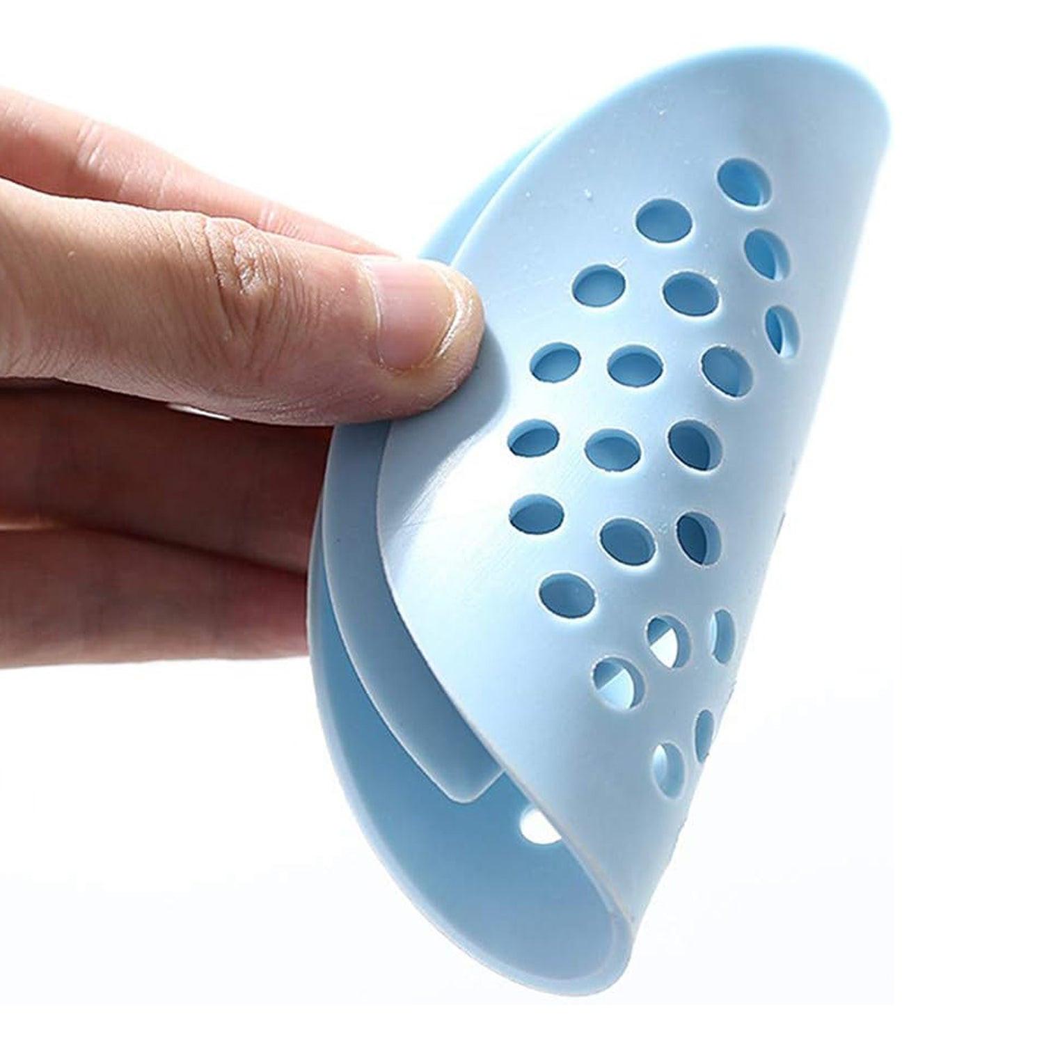 Blue anti-odor drain cover for bathroom that prevents clogs and bad smells.