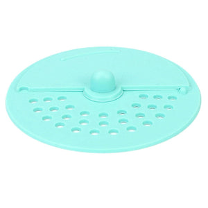 Durable anti-odor drain cover for bathroom in teal color designed to prevent odors and block debris