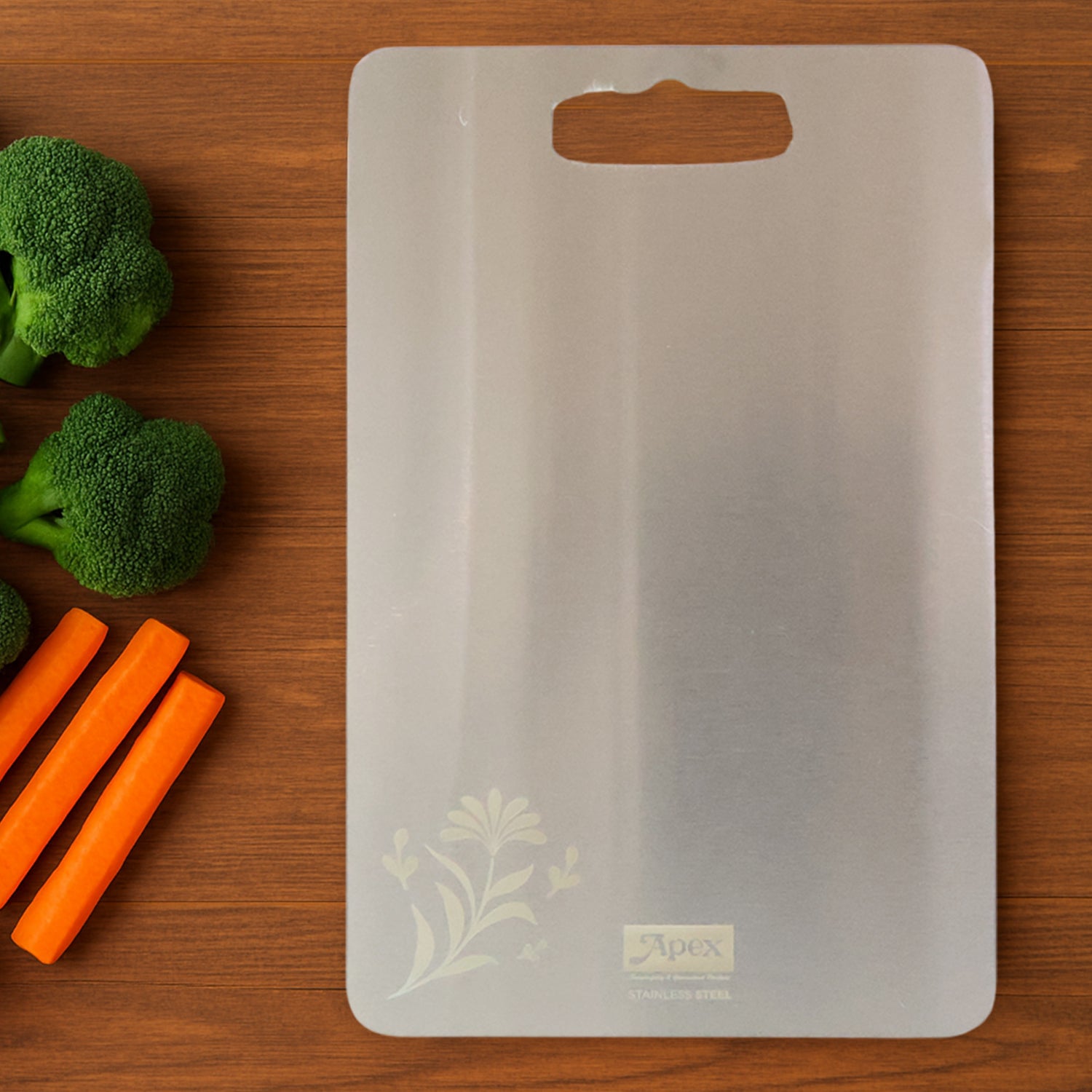 Superior eMart stainless steel chopping board on wooden kitchen surface with vegetables