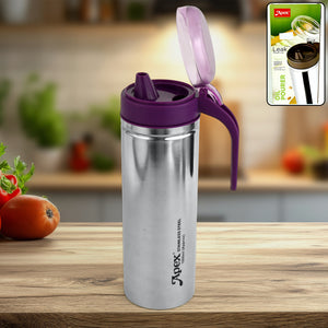 Superior eMart stainless steel oil pourer with purple lid and spout on wooden kitchen counter