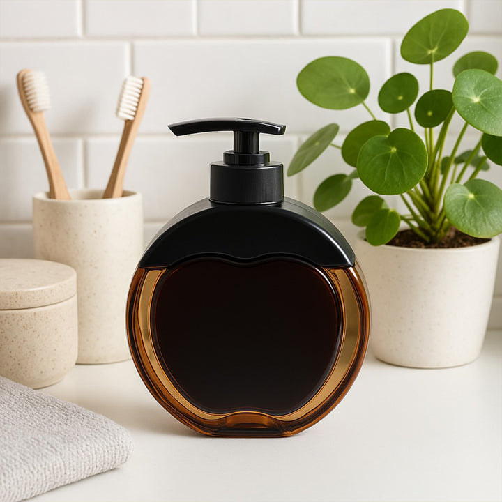 Stylish refillable liquid soap dispenser with an apple-shaped design, perfect for modern kitchens