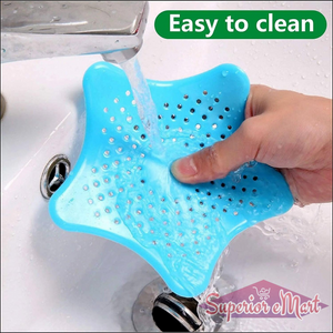 Silicone star shaped sink filter in blue, easy to clean and designed to catch debris in sinks