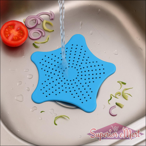 Blue silicone star shaped sink filter with perforations, designed for catching food debris in the kitchen sink