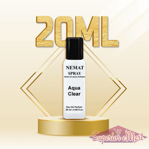 Nemat Aqua Clear 20ml Eau De Parfum. White bottle, black cap on gold podium with gold '20ML' text background.