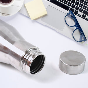 Superior eMart stainless steel insulated water bottle with open lid on a desk near laptop and glasses