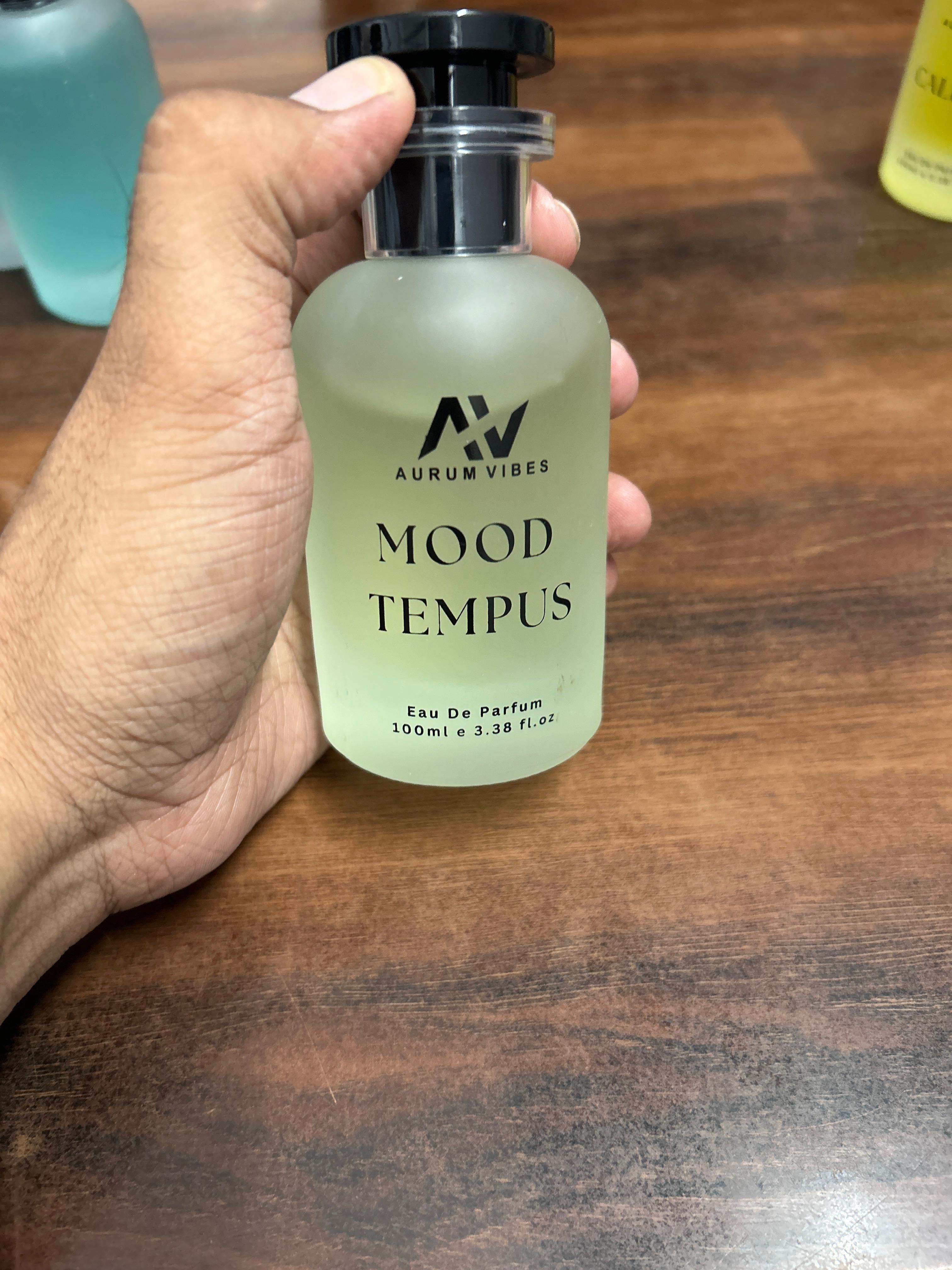 Aurum Vibes Mood Tempus Unisex Perfume 100ml in a clear bottle with a black cap