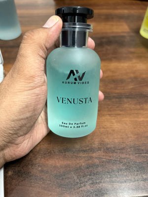Venusta male perfume 100ml bottle held in hand with sleek design and modern branding