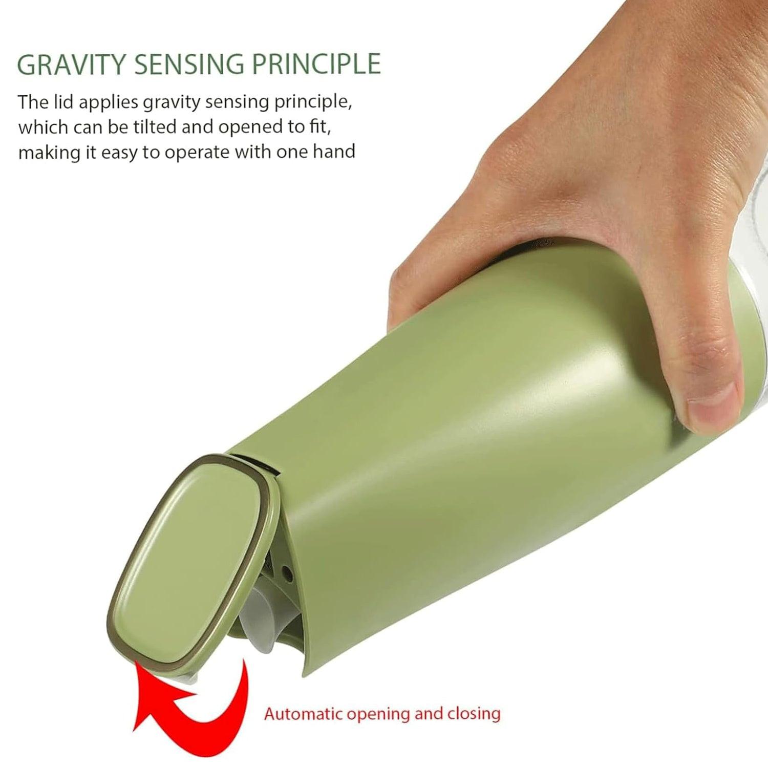 Automatic oil dispenser for kitchen with gravity sensing mechanism for easy one-handed operation