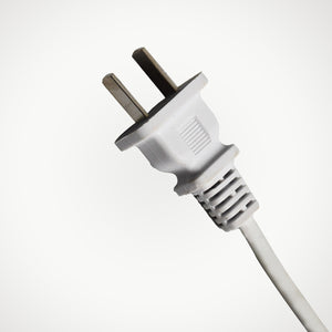 Close-up of white power plug for automatic yogurt maker for home use