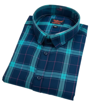 Folded blue and green plaid shirt with 'Varteks' brand label on a white background