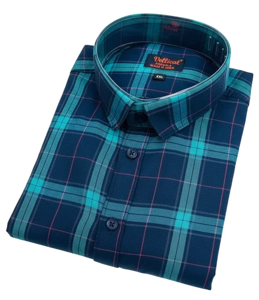 Folded blue and green plaid shirt with 'Varteks' brand label on a white background