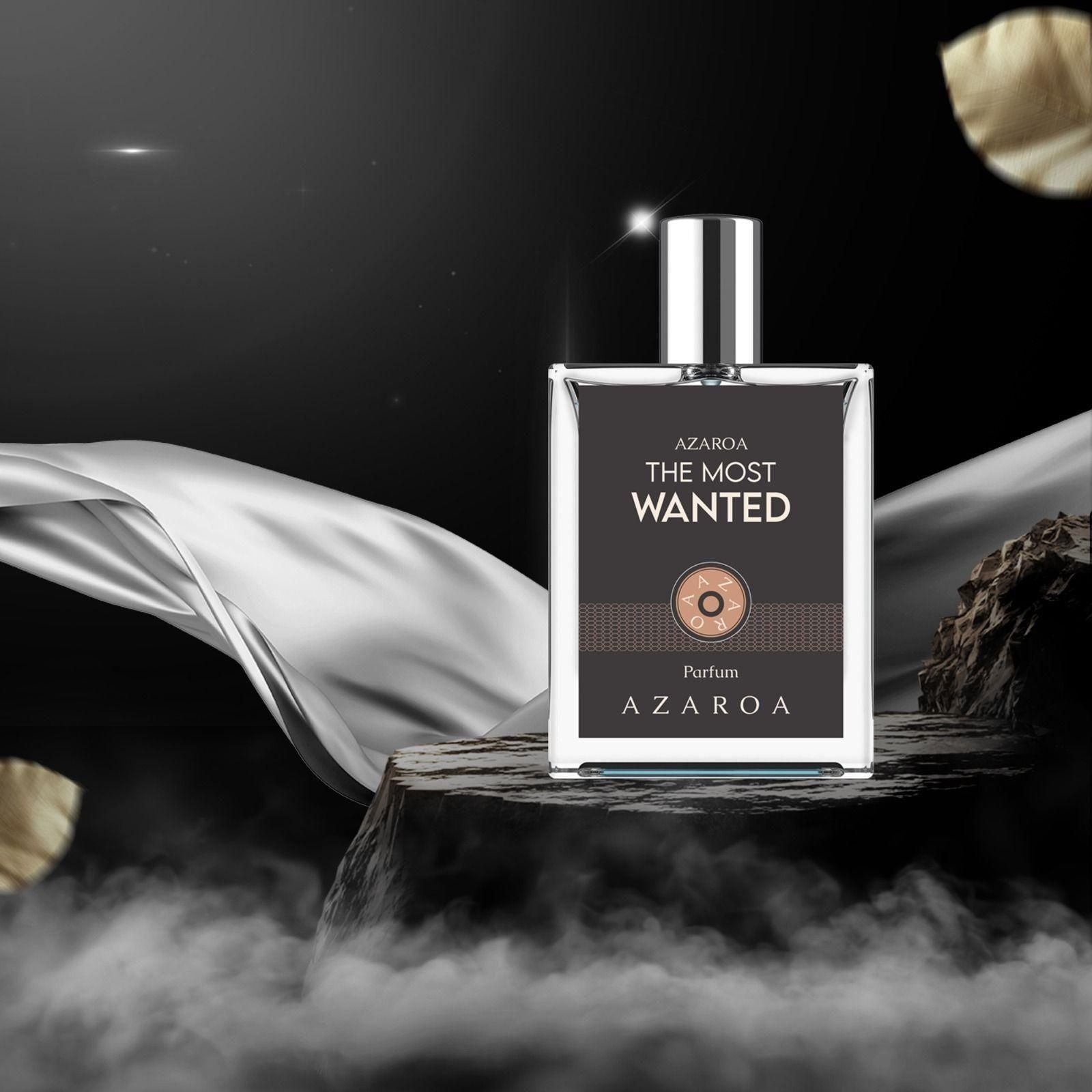 Azaroa The Most Wanted Perfumes bottle on wooden display with dramatic background and flowing silk