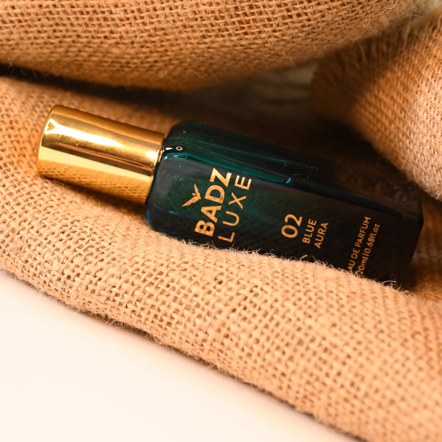 Badz Luxe perfume set with elegant bottle design and fresh blue aura scent for a luxurious experience