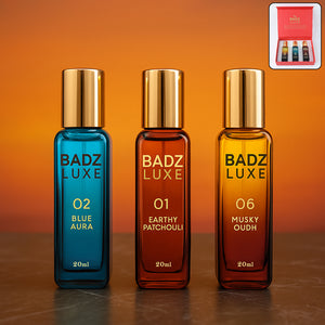 Badz Luxe perfume set featuring Blue Aura, Earthy Patchouli, and Musky Oudh fragrances in elegant bottles
