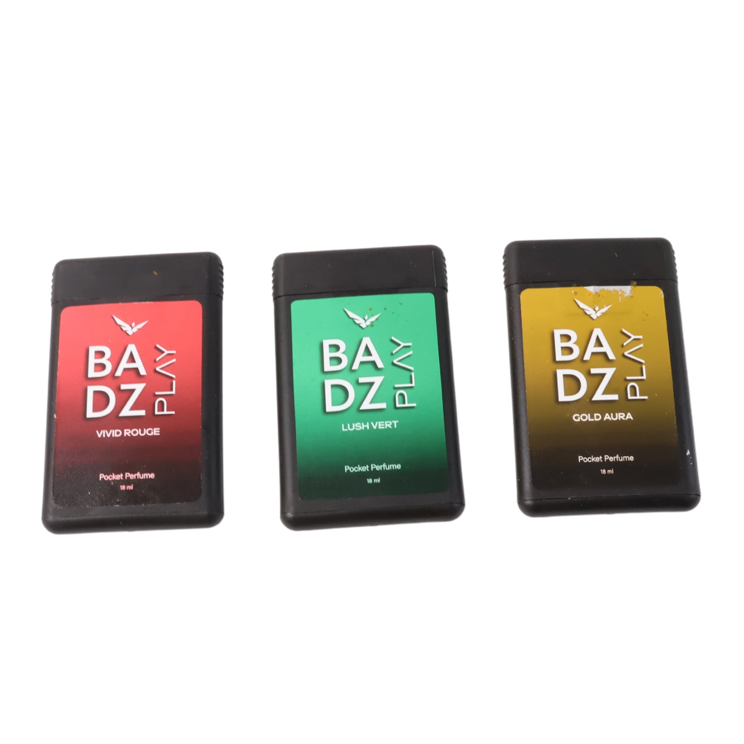 Set of three mini pocket perfumes by Badz Play in Vivid Rouge, Lush Vert, and Gold Aura scents