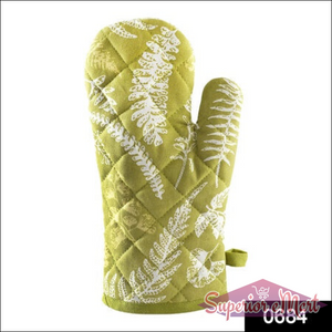 Stylish heat proof oven glove in green with fern pattern for safe handling of hot cookware