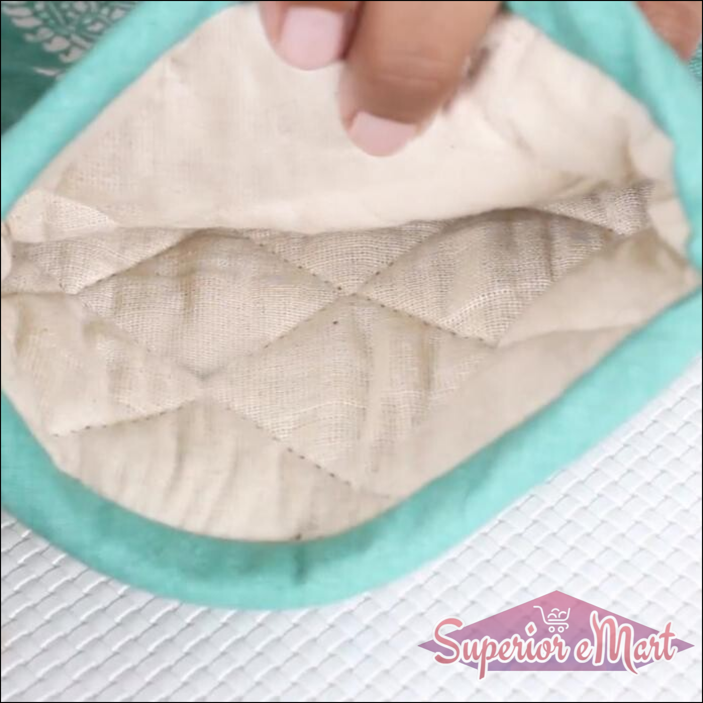 Interior view of a heat proof oven glove showcasing its quilted lining for added protection and comfort