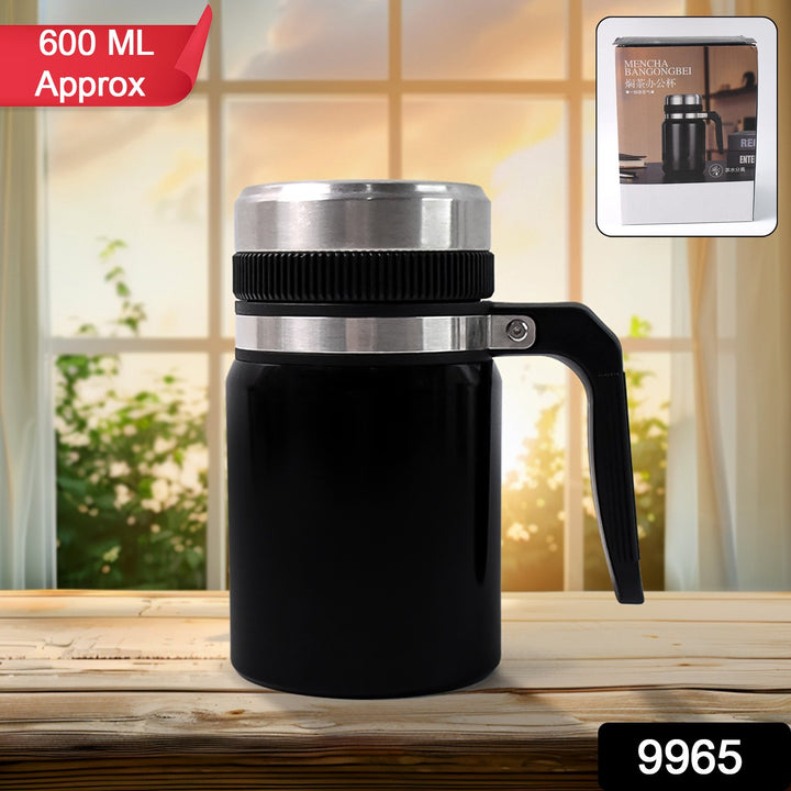 600ml insulated coffee mug with handle in black and silver design on wooden table