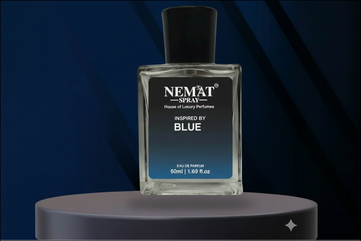Nemat Spray Inspired by Blue 50ml perfume bottle, clear glass with black cap, floating above a grey pedestal.