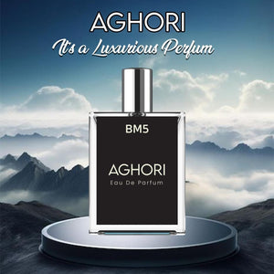AGHORI The Mystical Perfume in a sleek bottle against a scenic mountain backdrop