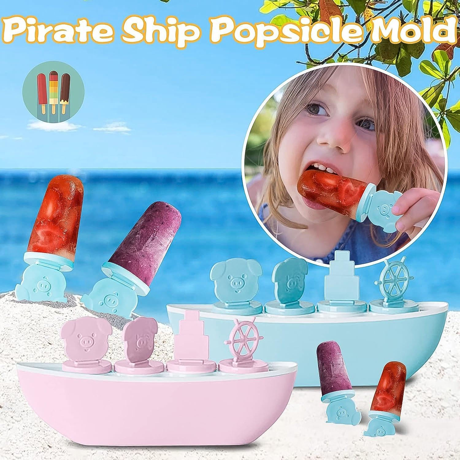 Boat shaped ice cream mold in pink and blue with pirate ship design for fun popsicle making