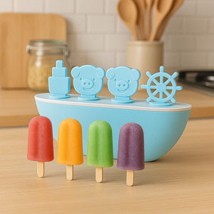 Boat shaped ice cream mold set with colorful popsicles in a kitchen setting