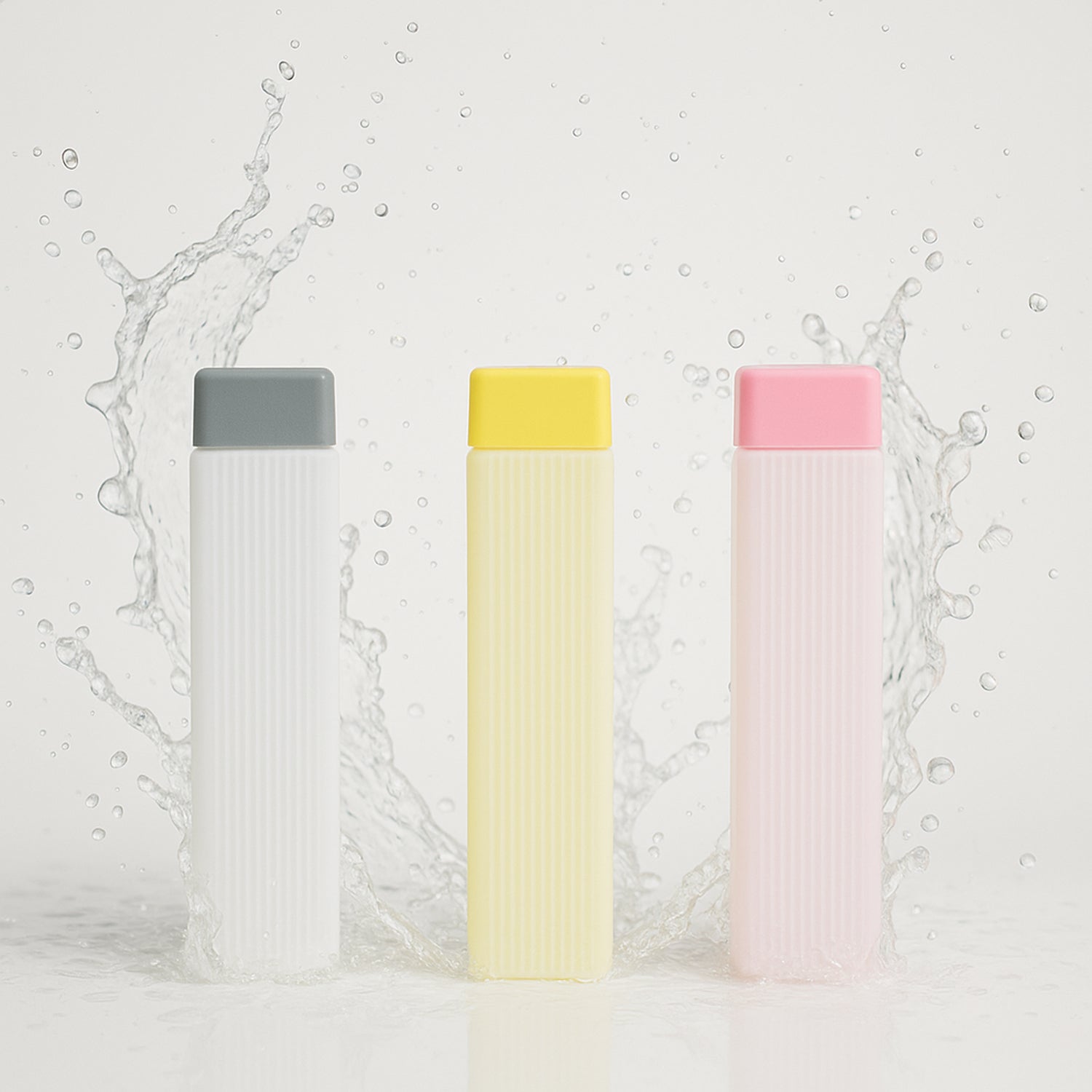 Superior eMart BPA-free hydration water bottles in gray, yellow, and pink with splash water background