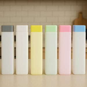 Set of six BPA-free hydration water bottles with colorful caps in gray white yellow green pink and blue