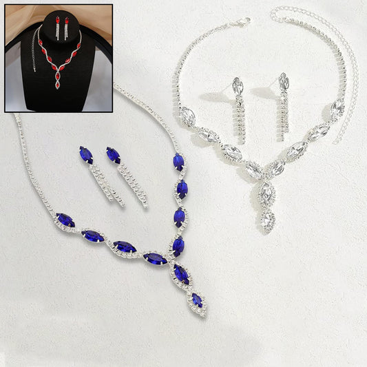 Elegant bridal necklace and earrings set featuring blue gemstones and silver accents for weddings