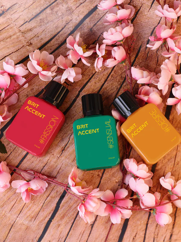 Premium women's fragrance gift set featuring three vibrant scent bottles in various colors