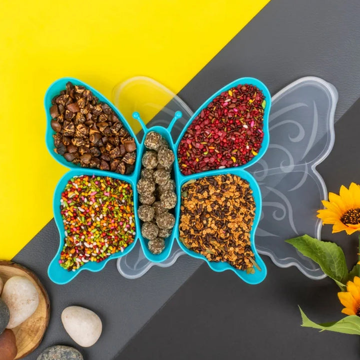 Colorful butterfly shaped snack tray divided into sections for nuts and treats